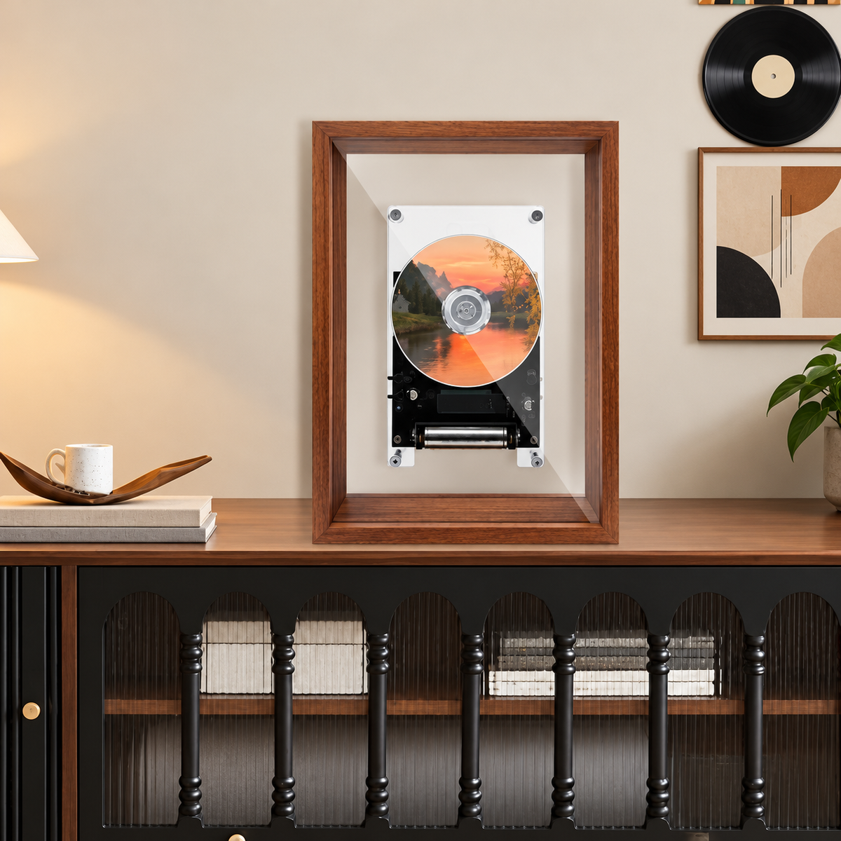 Fattori SoundFrame transparent CD player displayed on a walnut console in a modern interior