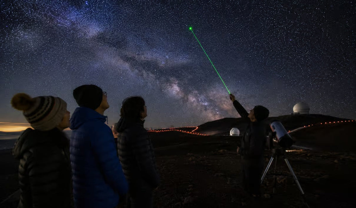 Guests on a laser-guided constellations tour on Hawaii's Big Island