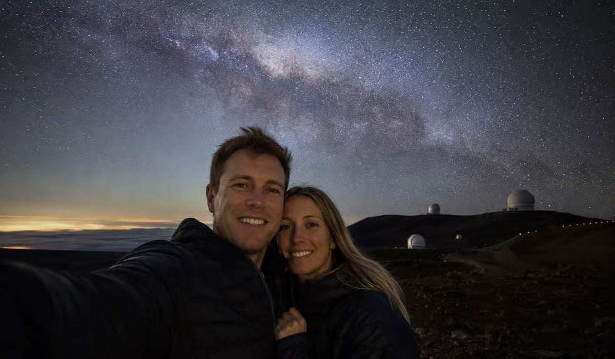 Couple beneath the Milky Way during a Mauna Kea stargazing experience in Hawaii