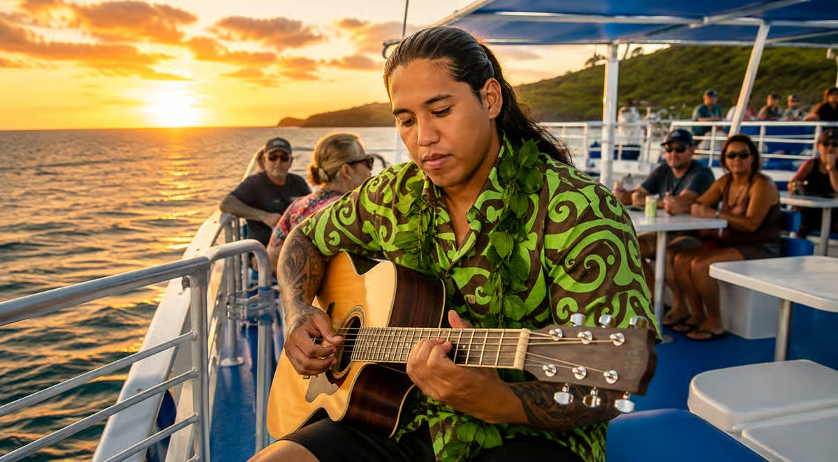 Hawaiian musician playing live acoustic guitar on a Kona sunset cruise