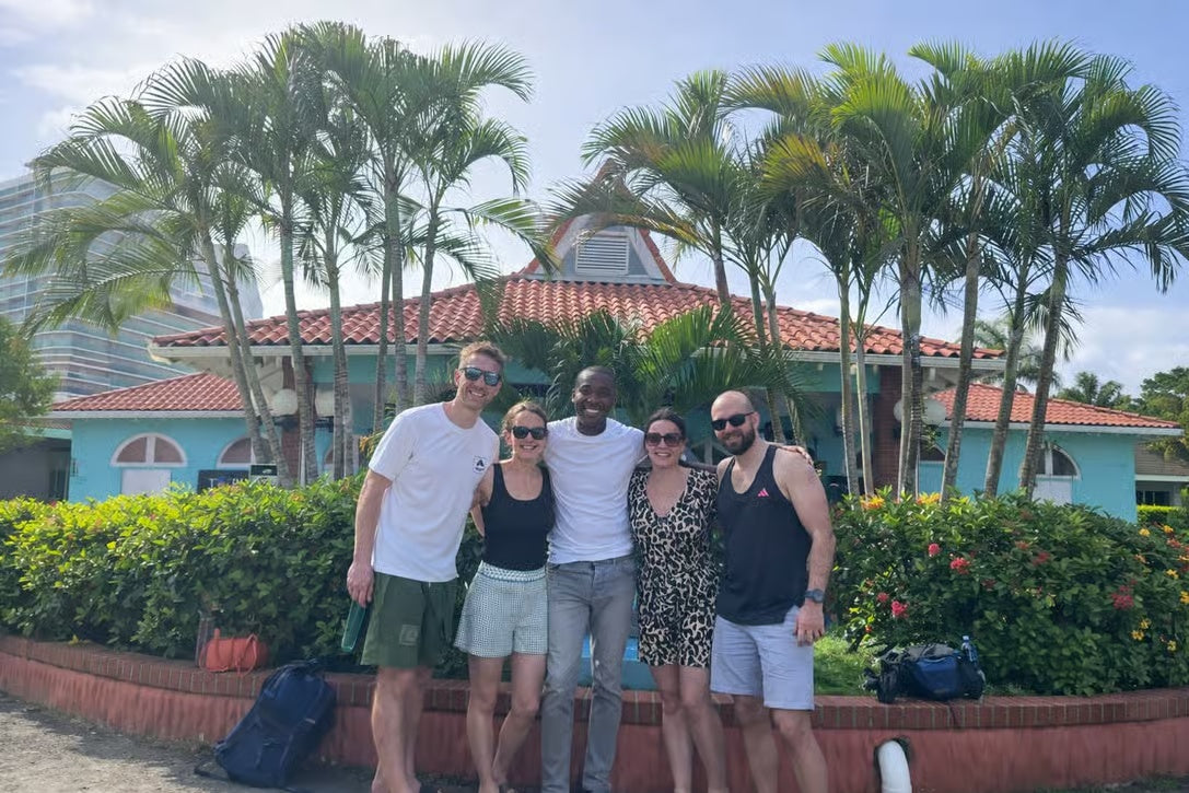 Visitors smiling with their local guide on a private St Lucia island excursion