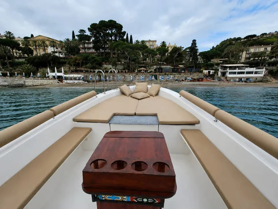 Private Taormina boat sun deck with beige cushions